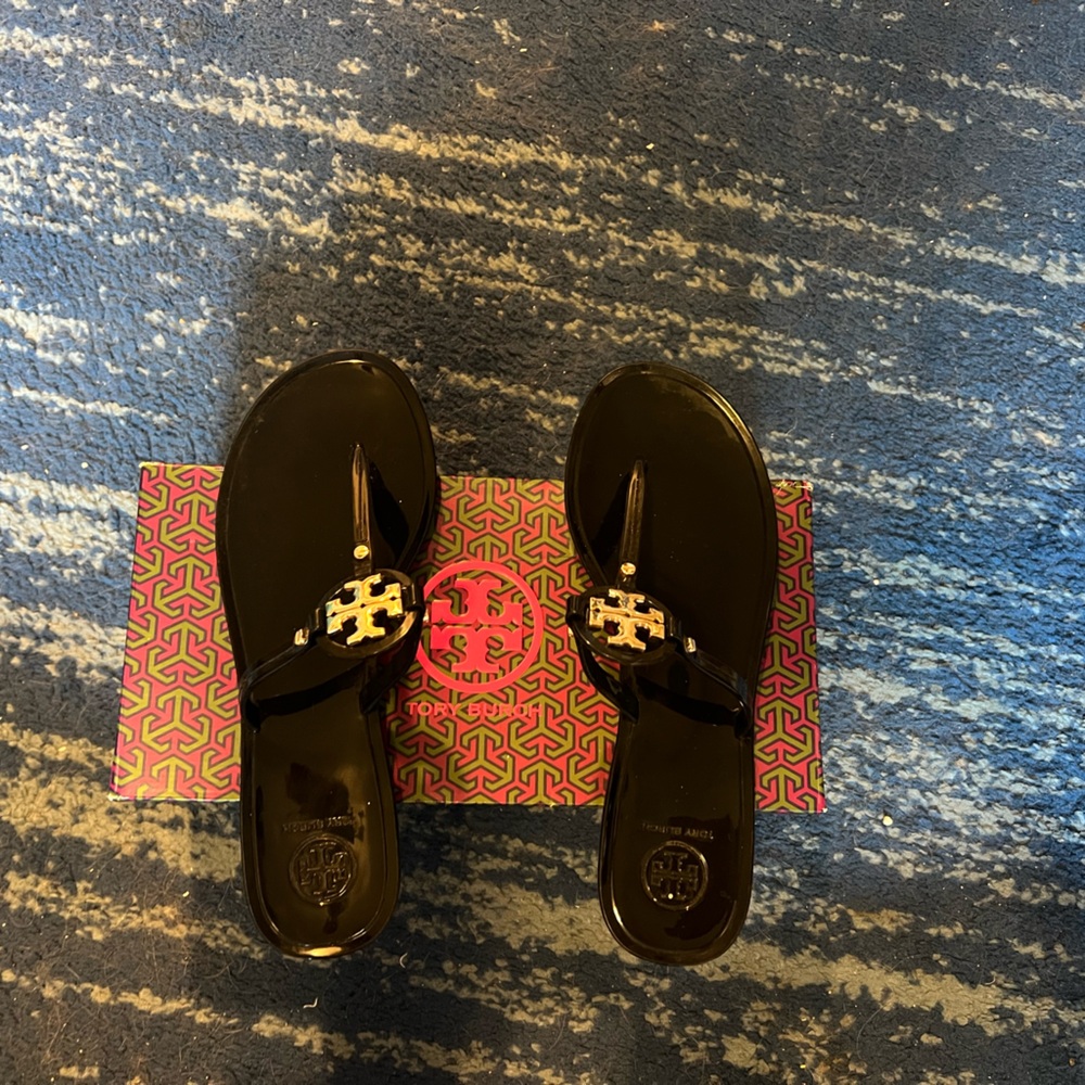 Tory Burch Black Flip Flops with Gold Emblem